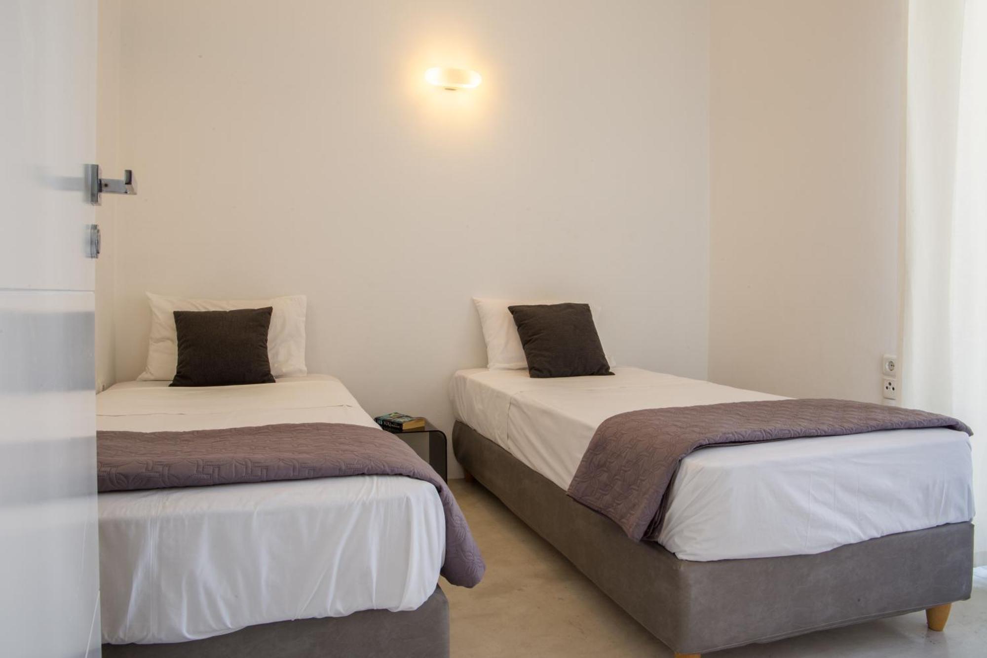 Edem Suites Andros Town Quarto foto