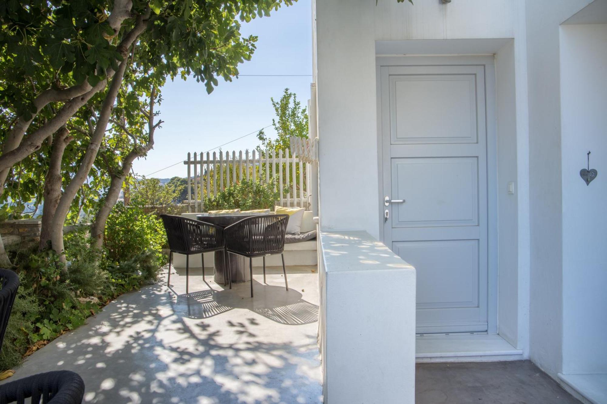 Edem Suites Andros Town Quarto foto