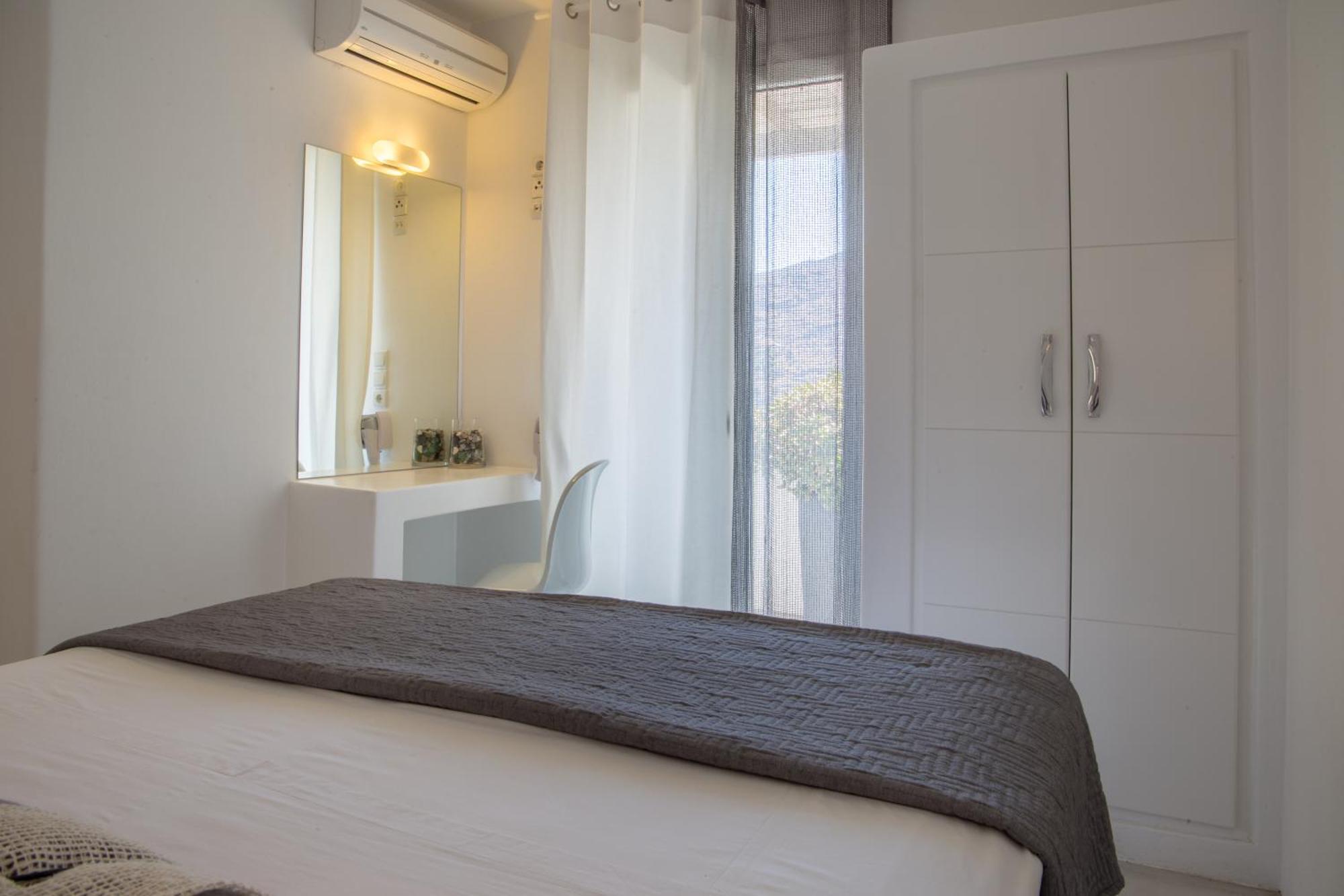 Edem Suites Andros Town Quarto foto
